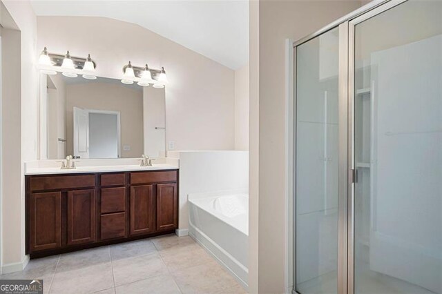 1957 Brightleaf Way Unit 59, Marietta, GA 30060 - full bathroom featuring lofted ceiling, a bath, a shower stall, double vanity, and tile patterned floors