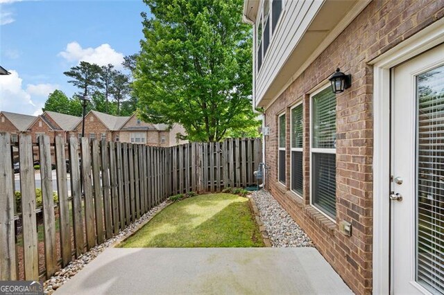 1957 Brightleaf Way Unit 59, Marietta, GA 30060 - fenced backyard with a patio area