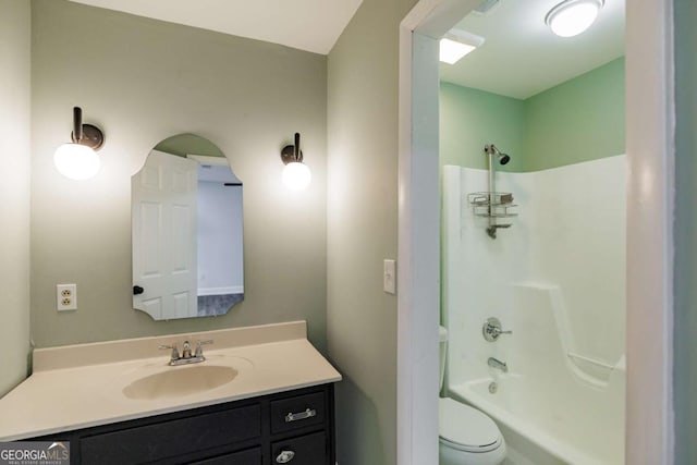 full bath with vanity, bathtub / shower combination, and toilet
