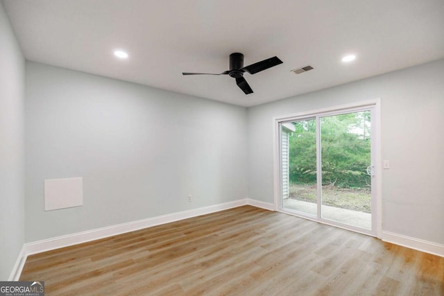 empty room with wood finished floors, baseboards, recessed lighting, and ceiling fan