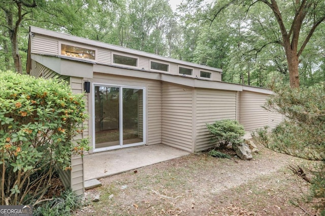 view of outbuilding with view of scattered trees