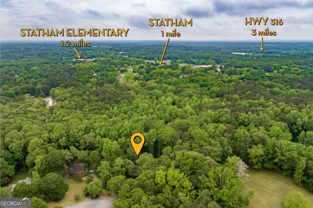 drone / aerial view of a heavily wooded area