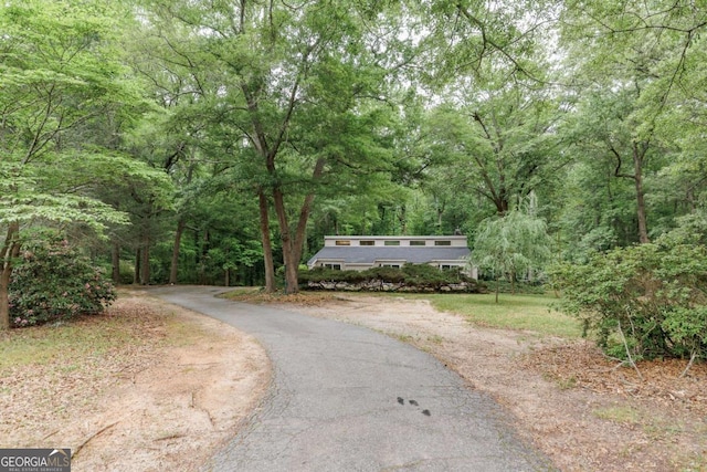 view of home's community with a view of trees