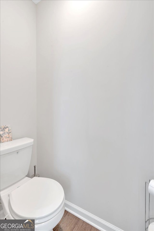 48 Sweetgum Trce, Dallas, GA 30132 - bathroom with wood finished floors, baseboards, and toilet