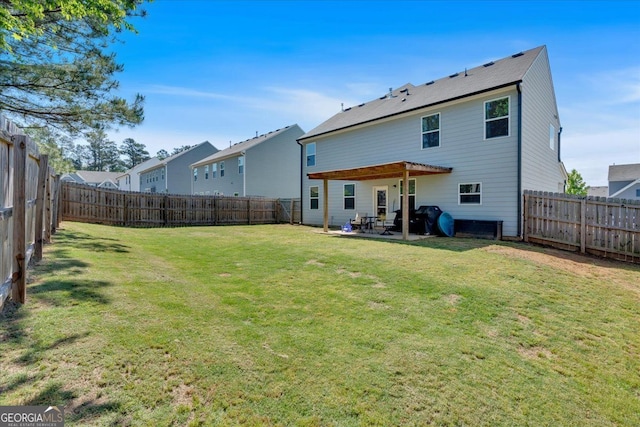 48 Sweetgum Trce, Dallas, GA 30132 - back of property with a patio