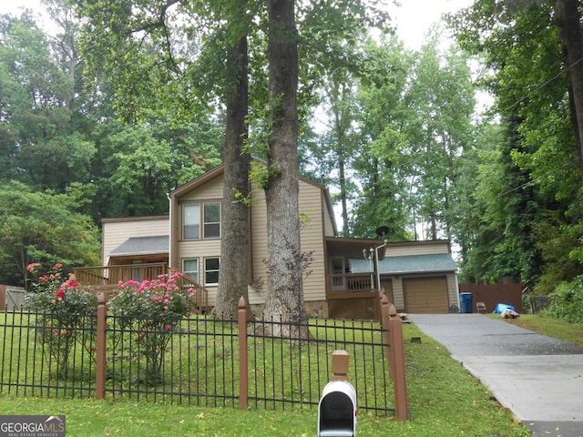 mid-century home with a garage and concrete driveway