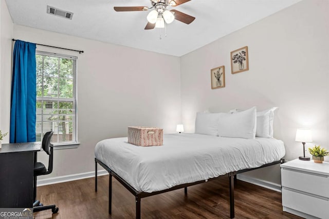 26 Springbottom Dr, Lawrenceville, GA 30046 - bedroom featuring dark wood-style flooring, baseboards, ceiling fan, and an office area