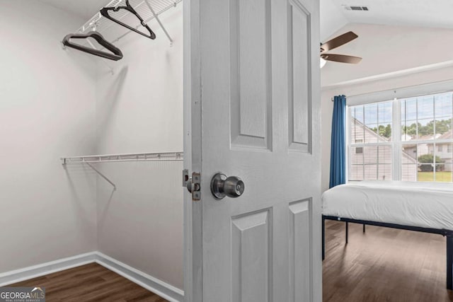 26 Springbottom Dr, Lawrenceville, GA 30046 - walk in closet with dark wood-type flooring, vaulted ceiling, and ceiling fan