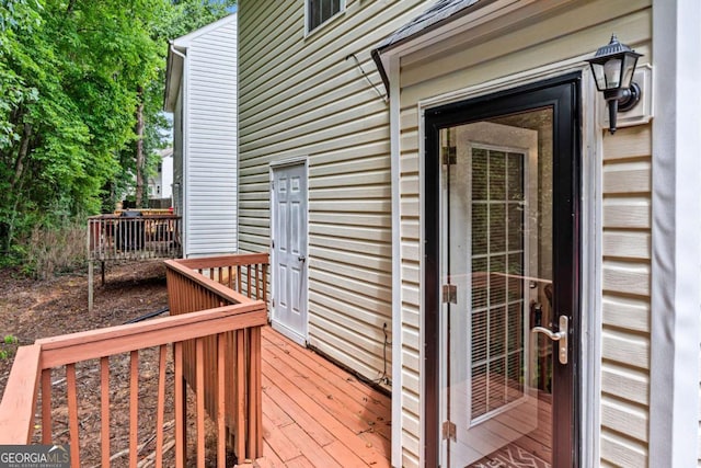 26 Springbottom Dr, Lawrenceville, GA 30046 - property entrance with a wooden deck