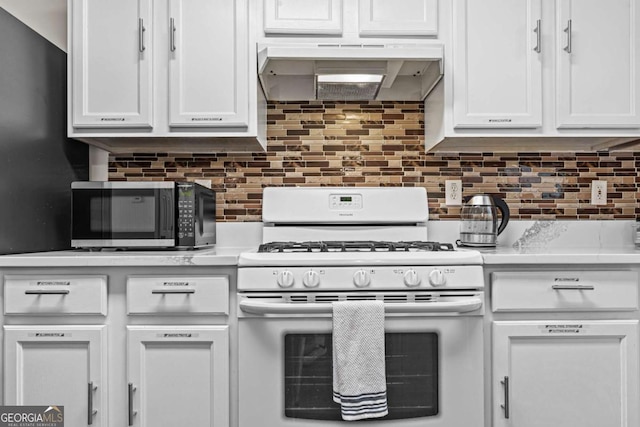 26 Springbottom Dr, Lawrenceville, GA 30046 - kitchen with white range with gas stovetop, under cabinet range hood, white cabinets, light countertops, and backsplash