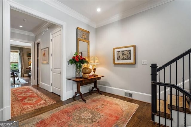 122 Old Ivy Rd NE Unit 17, Atlanta, GA 30342 - hall featuring wood finished floors, ornamental molding, stairs, baseboards, and recessed lighting