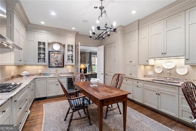 122 Old Ivy Rd NE Unit 17, Atlanta, GA 30342 - dining space with dark wood-style floors, a chandelier, wine cooler, recessed lighting, and ornamental molding