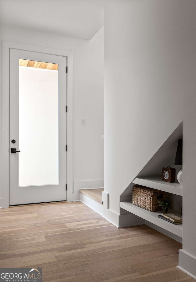 1230 Mado Loop, Chattahoochee Hills, GA 30268 - doorway featuring wood finished floors and baseboards