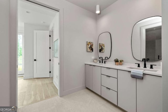 1230 Mado Loop, Chattahoochee Hills, GA 30268 - bathroom featuring double vanity and baseboards