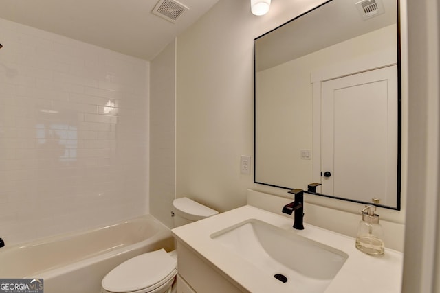 full bathroom featuring toilet, vanity, and shower / washtub combination