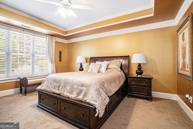 725 Windsor Place Cir SW, Grayson, GA 30017 - bedroom with light colored carpet, crown molding, baseboards, a ceiling fan, and a tray ceiling
