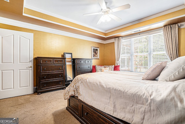 725 Windsor Place Cir SW, Grayson, GA 30017 - bedroom with light carpet, ornamental molding, a ceiling fan, and a tray ceiling
