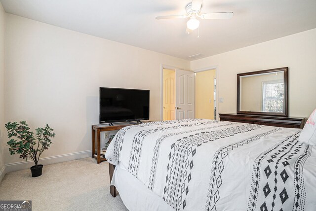 725 Windsor Place Cir SW, Grayson, GA 30017 - carpeted bedroom with baseboards and a ceiling fan