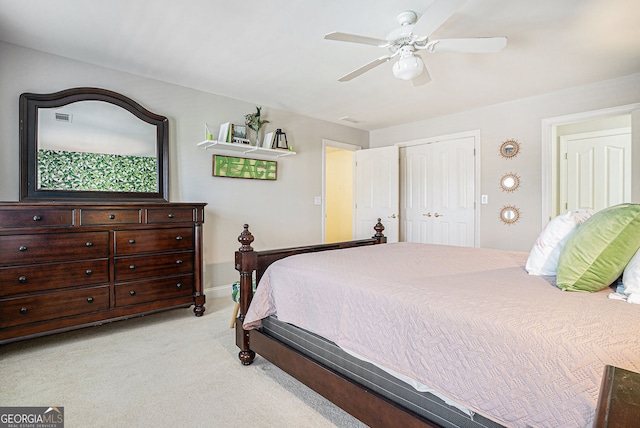725 Windsor Place Cir SW, Grayson, GA 30017 - bedroom featuring light colored carpet, a closet, ceiling fan, and baseboards