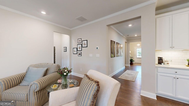 100 Maple Leaf Rd, Sharpsburg, GA 30277 - sitting room featuring dark wood-type flooring, ornamental molding, and recessed lighting