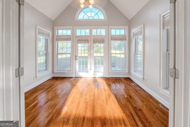 161 Pleasant Grove Rd, Mcdonough, GA 30252 - unfurnished sunroom featuring lofted ceiling and french doors