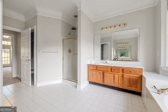 161 Pleasant Grove Rd, Mcdonough, GA 30252 - full bath with crown molding, a shower stall, a bath, vanity, and tile patterned floors