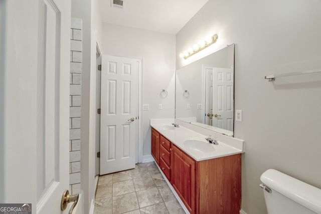 161 Pleasant Grove Rd, Mcdonough, GA 30252 - full bath with toilet and double vanity