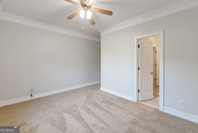 161 Pleasant Grove Rd, Mcdonough, GA 30252 - empty room with ornamental molding, carpet, a ceiling fan, and baseboards
