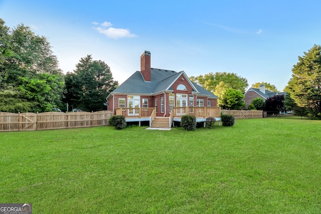 161 Pleasant Grove Rd, Mcdonough, GA 30252 - rear view of property with a wooden deck, a chimney, french doors, and brick siding