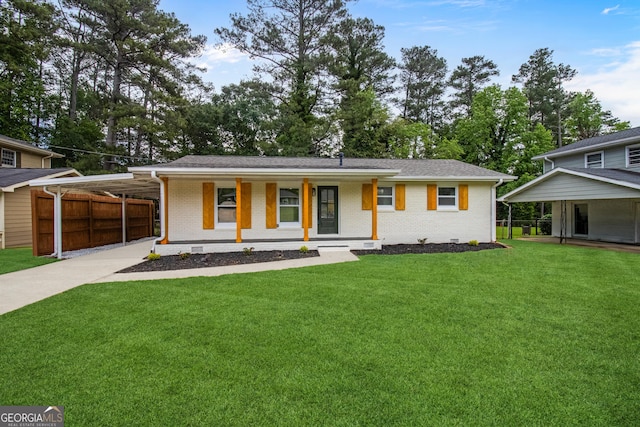 view of front facade featuring a porch, brick siding, concrete driveway, and an attached carport