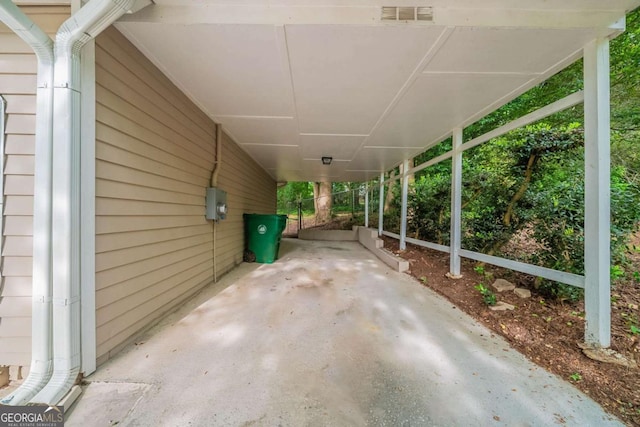 view of patio / terrace with an attached carport