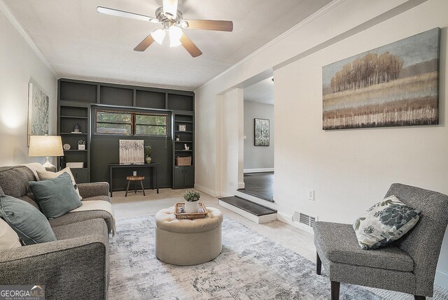 4128 Morgan Rd, Tucker, GA 30084 - living area featuring built in features, ceiling fan, carpet floors, and crown molding
