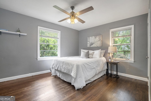 4128 Morgan Rd, Tucker, GA 30084 - bedroom featuring multiple windows, wood finished floors, and a ceiling fan