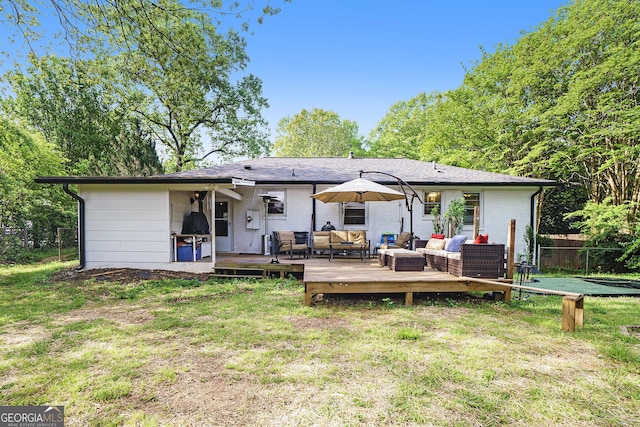 4128 Morgan Rd, Tucker, GA 30084 - back of property featuring outdoor lounge area, a wooden deck, and brick siding