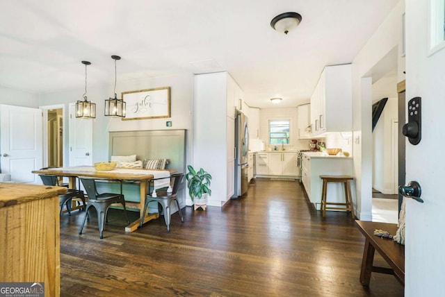 dining room featuring dark wood-type flooring