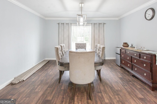 dining room with dark wood-style flooring, ornamental molding, and baseboards