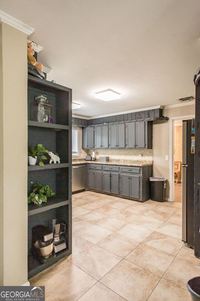 kitchen featuring stainless steel appliances, open shelves, light countertops, gray cabinetry, and crown molding