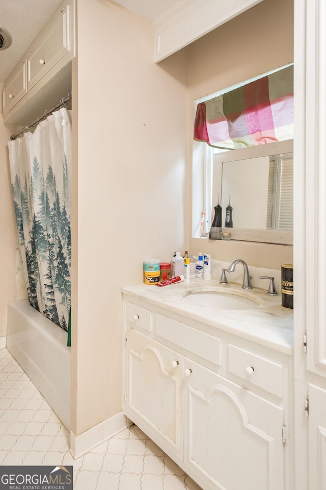 1002 Cherokee Cir, Waycross, GA 31501 - full bath featuring vanity, baseboards, and shower / bath combo