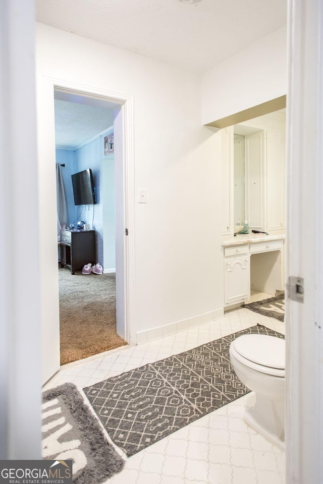 bathroom featuring toilet