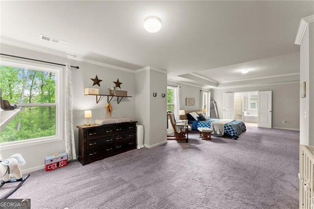 bedroom featuring crown molding, baseboards, multiple windows, and carpet floors
