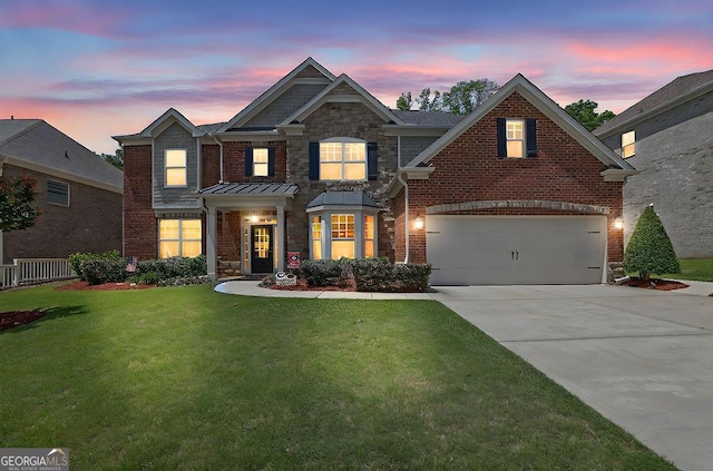 4100 Secret Shoals Way, Buford, GA 30518 - view of front facade featuring concrete driveway, stone siding, a garage, a front lawn, and brick siding