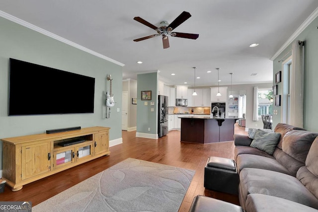 4100 Secret Shoals Way, Buford, GA 30518 - living area featuring a ceiling fan, crown molding, dark wood-type flooring, recessed lighting, and baseboards