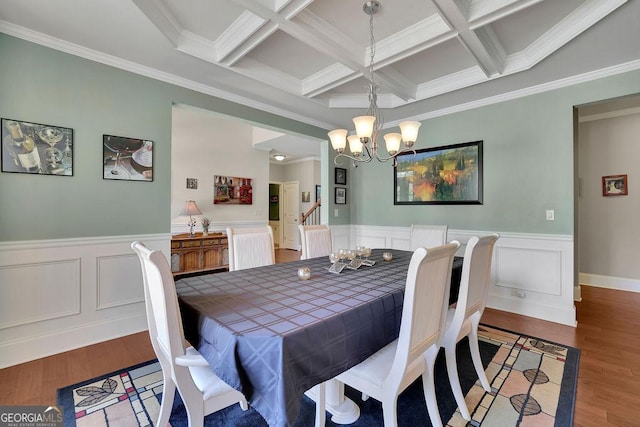 4100 Secret Shoals Way, Buford, GA 30518 - dining room featuring a chandelier, coffered ceiling, beamed ceiling, crown molding, and wood finished floors