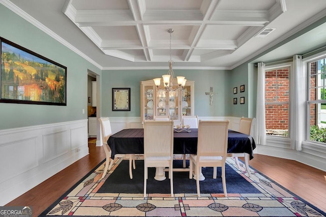 4100 Secret Shoals Way, Buford, GA 30518 - dining space featuring hardwood / wood-style flooring, a chandelier, beamed ceiling, coffered ceiling, and ornamental molding
