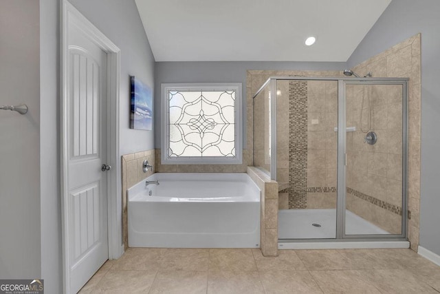 4100 Secret Shoals Way, Buford, GA 30518 - full bath featuring lofted ceiling, a garden tub, a shower stall, and tile patterned floors