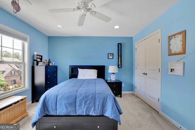 4100 Secret Shoals Way, Buford, GA 30518 - bedroom featuring light carpet, ceiling fan, a closet, and recessed lighting
