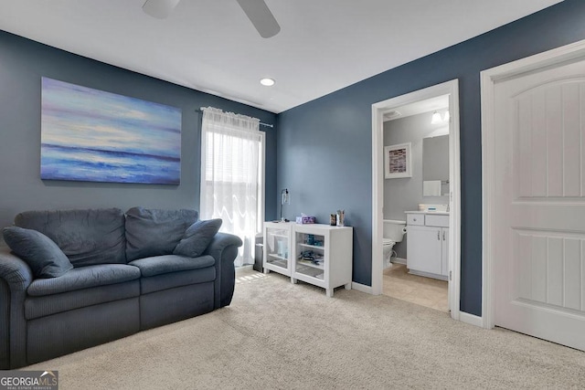 4100 Secret Shoals Way, Buford, GA 30518 - living area with light colored carpet, ceiling fan, and baseboards