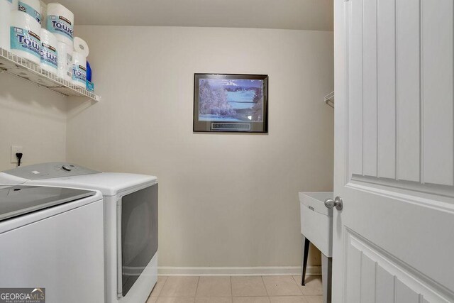 4100 Secret Shoals Way, Buford, GA 30518 - washroom featuring separate washer and dryer, baseboards, and light tile patterned floors