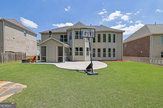4100 Secret Shoals Way, Buford, GA 30518 - rear view of house featuring a sunroom and a patio