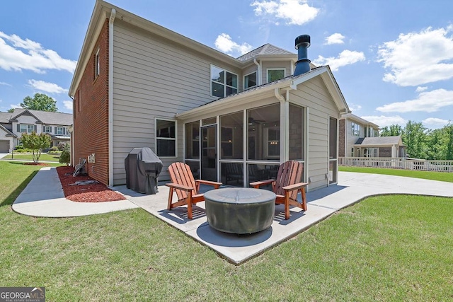4100 Secret Shoals Way, Buford, GA 30518 - back of house with a patio, a sunroom, and an outdoor fire pit